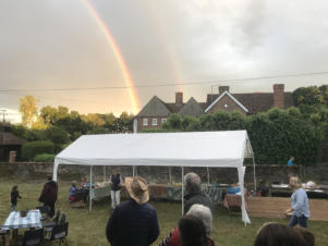 Photo of gazebo with rainbow